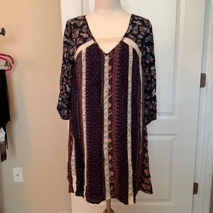 Women’s Dress Size Small, Very Loose, Multi Colored, Short Length.